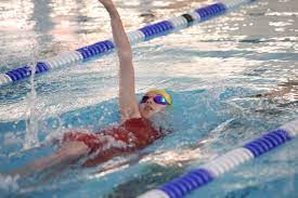 Girl Swimming Backstroke